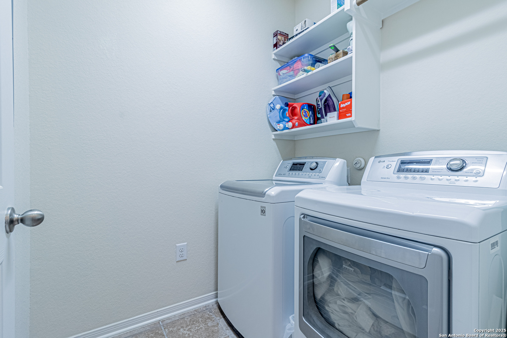 159 Brook View Cibolo, TX 78108 - Photo 22 of 24 a utility room with dryer and washer