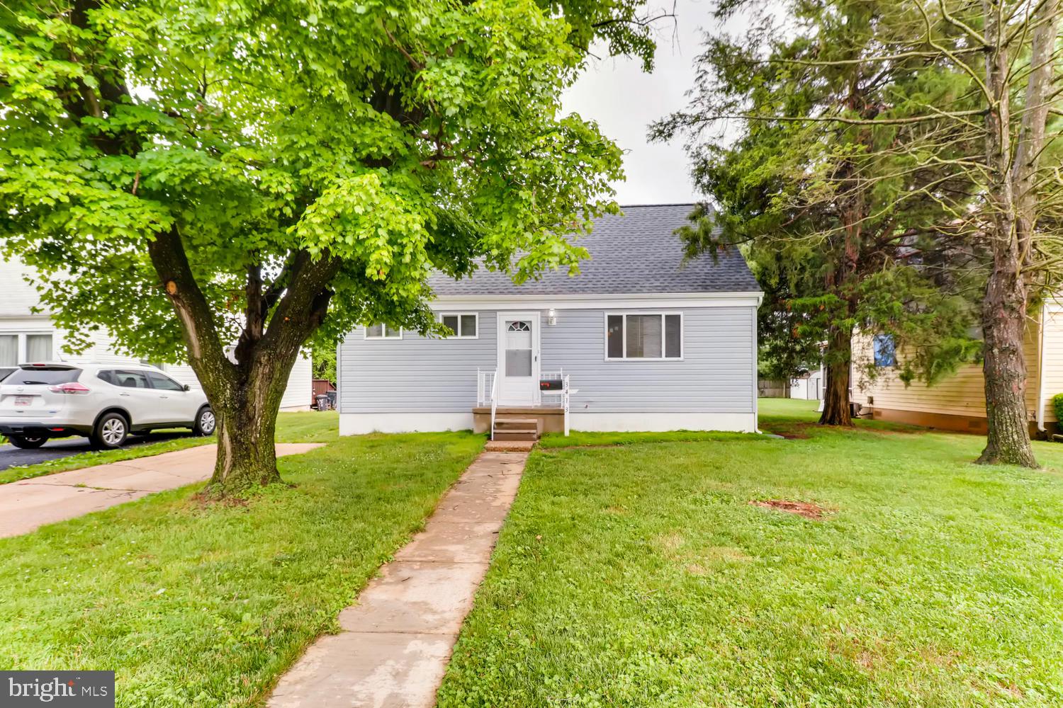 3413 Kimble Road Windsor Mill, MD 21244 - Photo 2 of 28 a view of a yard in front of house