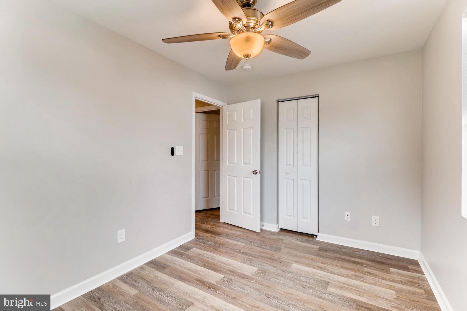 3413 Kimble Road Windsor Mill, MD 21244 - Photo 11 of 28 a view of an empty room and chandelier fan