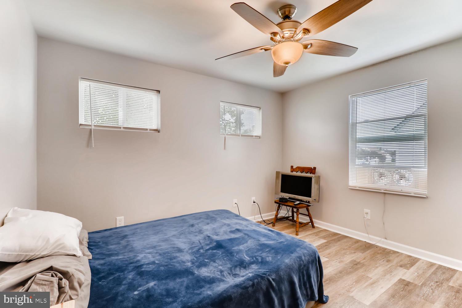 3413 Kimble Road Windsor Mill, MD 21244 - Photo 13 of 28 a bedroom with a bed and a ceiling fan