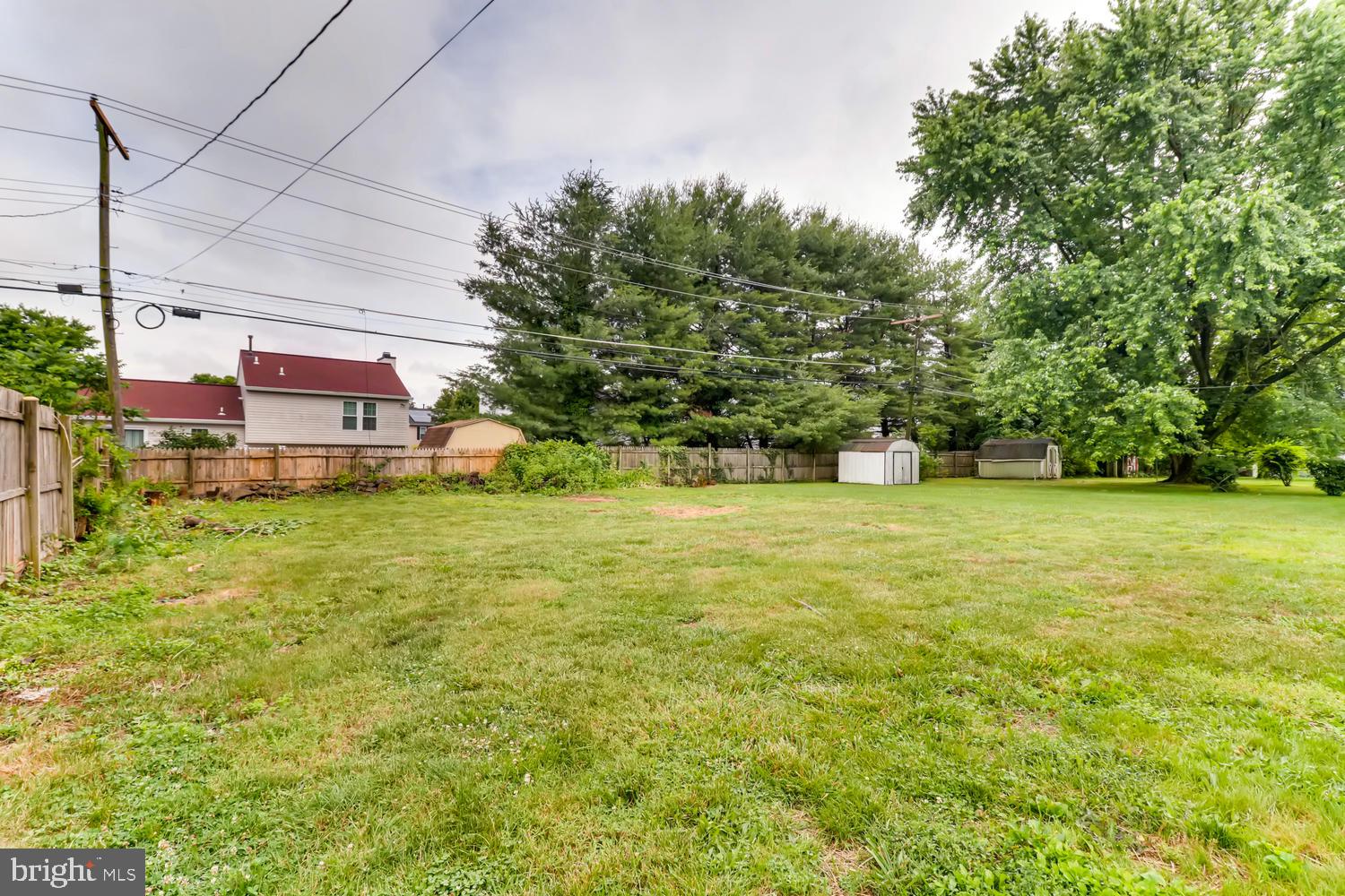 3413 Kimble Road Windsor Mill, MD 21244 - Photo 23 of 28 a view of a yard with a house