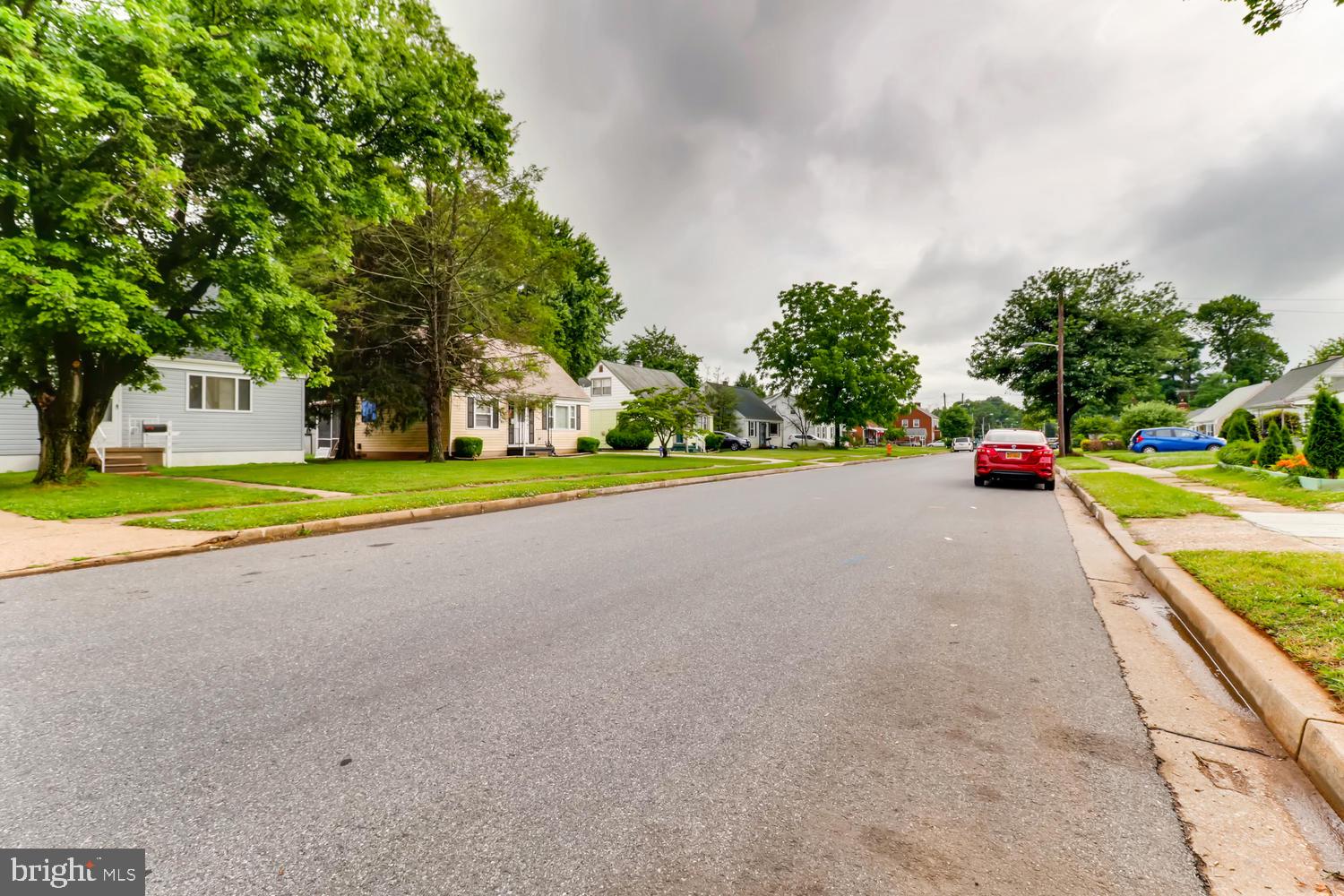 3413 Kimble Road Windsor Mill, MD 21244 - Photo 25 of 28 a view of road with grass and trees
