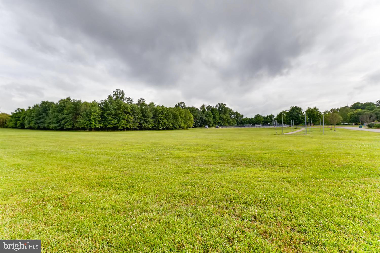 3413 Kimble Road Windsor Mill, MD 21244 - Photo 27 of 28 a view of yard with swimming pool and green