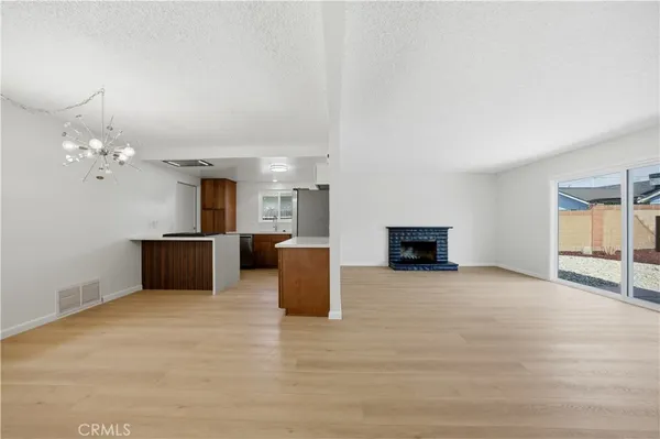 a view of kitchen and a microwave