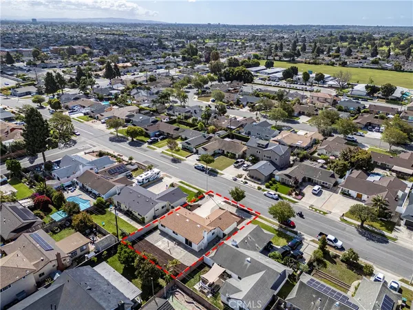 an aerial view of a city with lots of residential buildings