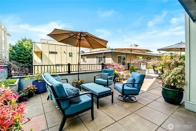 a view of a terrace with furniture