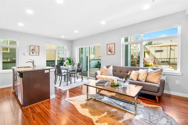 a living room with furniture and a table