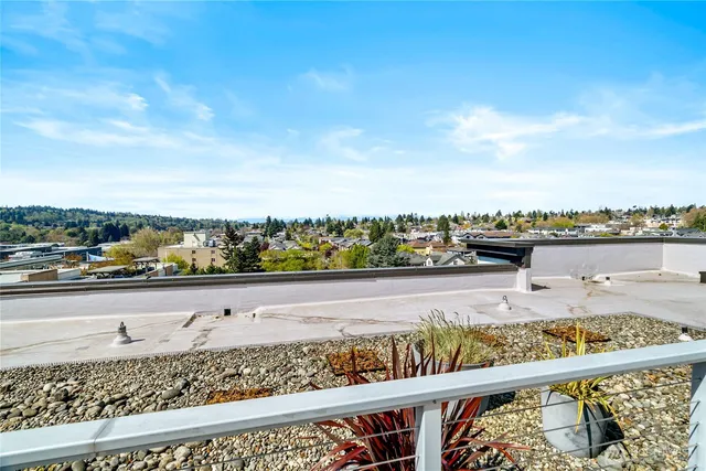 a view of swimming pool with a chairs