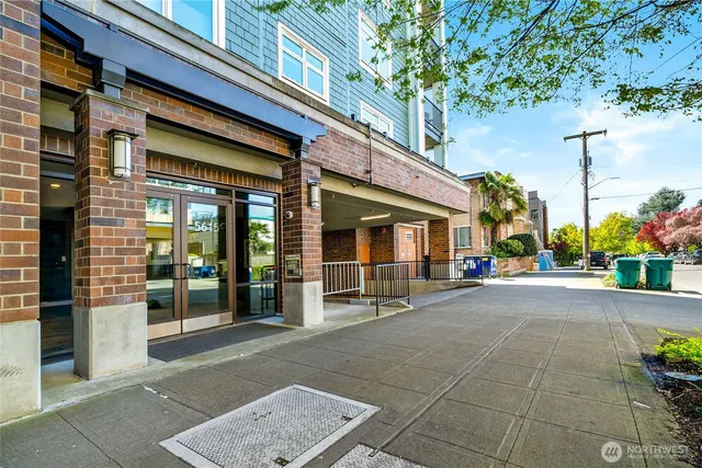 a view of a building with sitting area