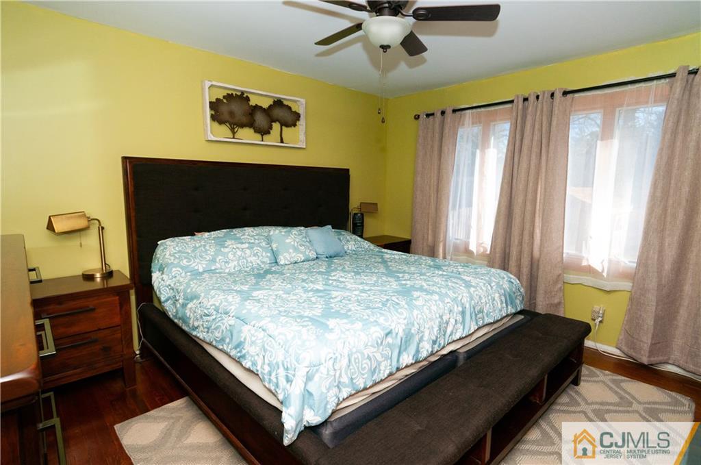 18 Rutgers Road Old Bridge, NJ 08859 - Photo 12 of 30 a bed sitting in a bedroom next to a window