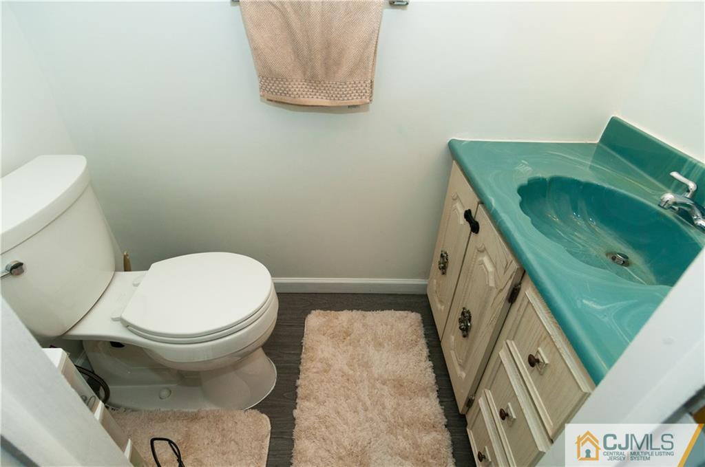 18 Rutgers Road Old Bridge, NJ 08859 - Photo 15 of 30 a bathroom with a toilet and a sink