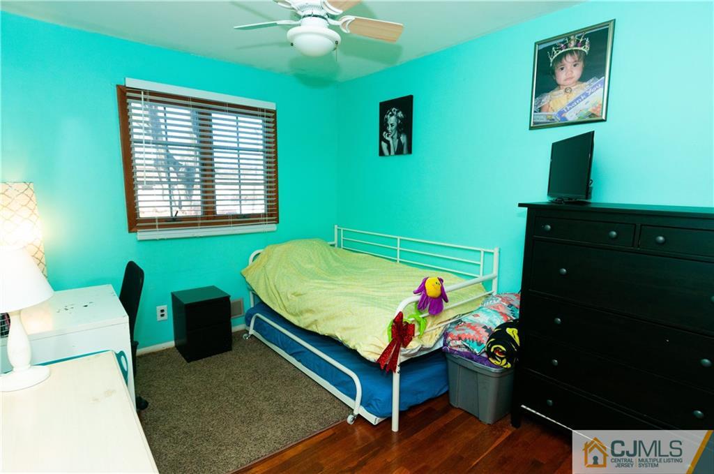 18 Rutgers Road Old Bridge, NJ 08859 - Photo 16 of 30 a bedroom with a bed and a dresser
