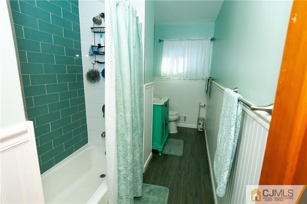 18 Rutgers Road Old Bridge, NJ 08859 - Photo 18 of 30 a bathroom with a tub and shower