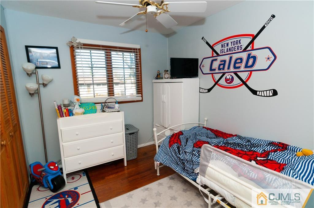 18 Rutgers Road Old Bridge, NJ 08859 - Photo 19 of 30 a bedroom with a bed and a window