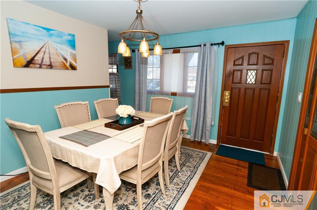 18 Rutgers Road Old Bridge, NJ 08859 - Photo 3 of 30 a view of a dining room with furniture window and wooden floor