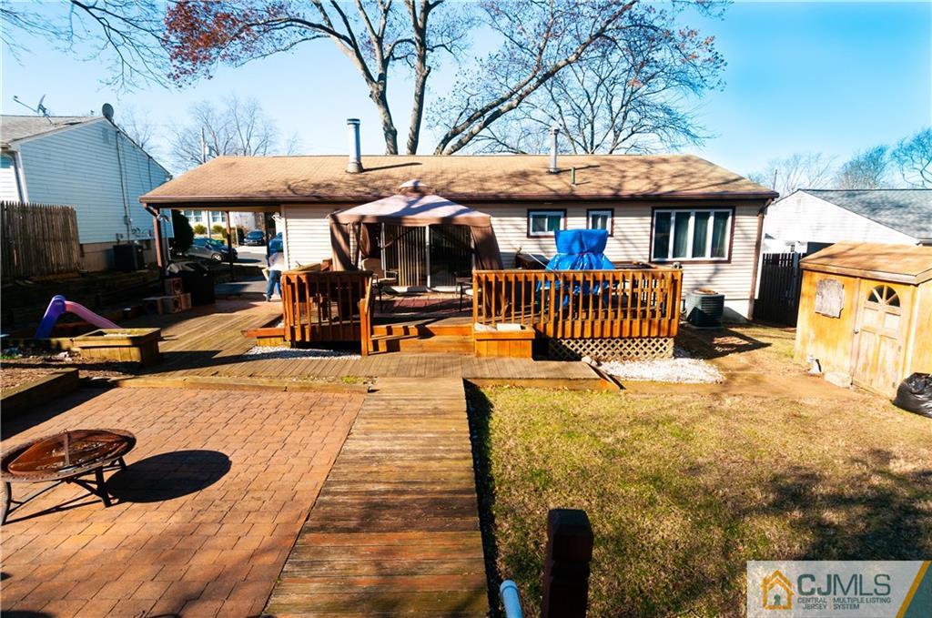 18 Rutgers Road Old Bridge, NJ 08859 - Photo 25 of 30 an outdoor space with swimming pool and furniture