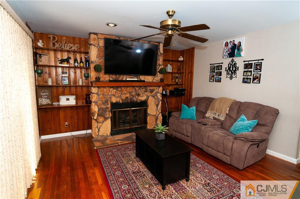 18 Rutgers Road Old Bridge, NJ 08859 - Photo 7 of 30 a living room with furniture and a flat screen tv