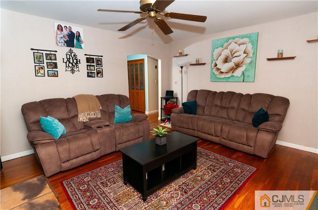 18 Rutgers Road Old Bridge, NJ 08859 - Photo 8 of 30 a living room with furniture and a rug