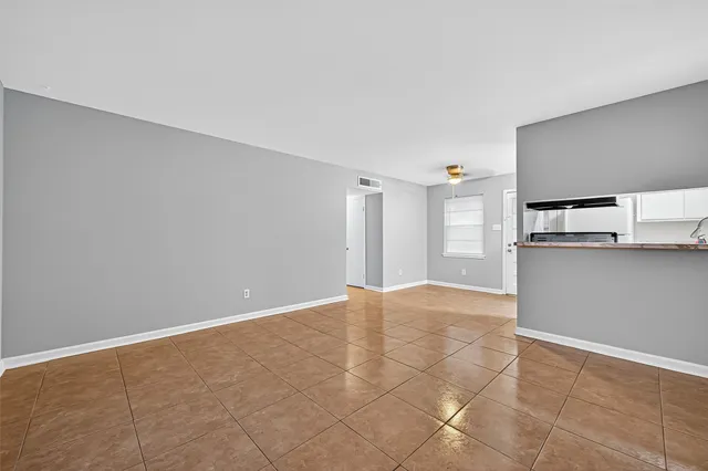 a view of a kitchen with a sink