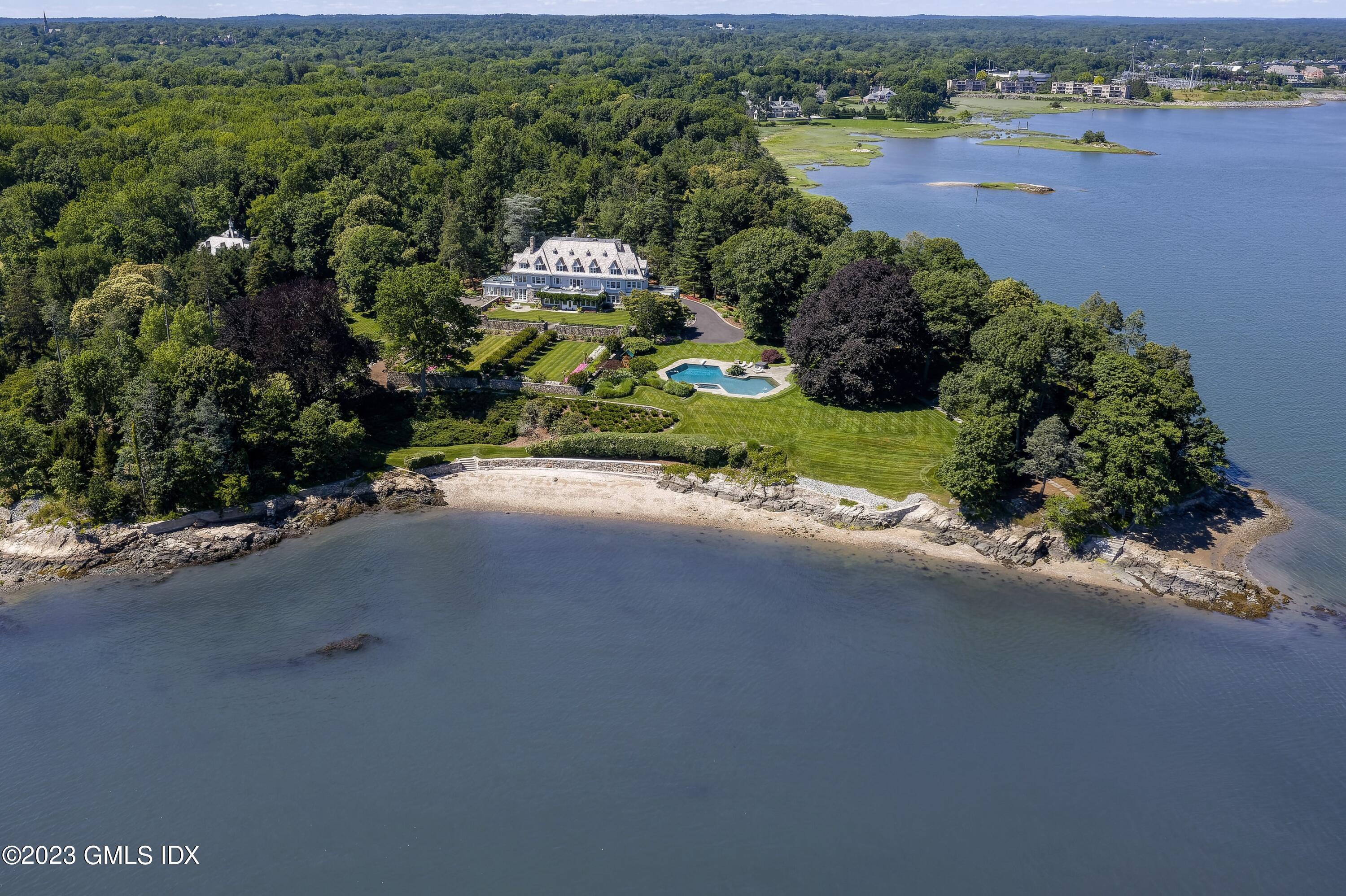 499 Indian Field Road Greenwich, CT 06830 - Photo 1 of 1 an aerial view of a houses with outdoor space and street view