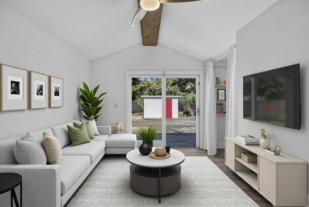181 Northeast 15th Terrace Boca Raton, FL 33431 - Photo 13 of 51 a living room with furniture and a flat screen tv
