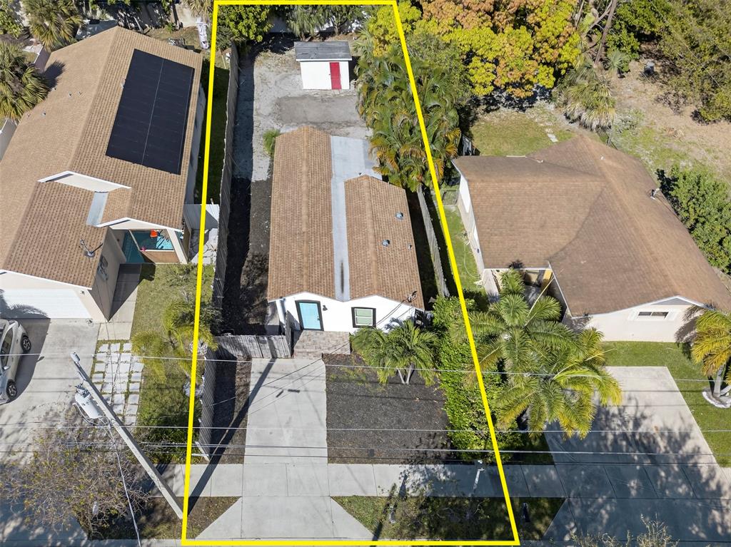 181 Northeast 15th Terrace Boca Raton, FL 33431 - Photo 2 of 51 a picture of a building with a yard