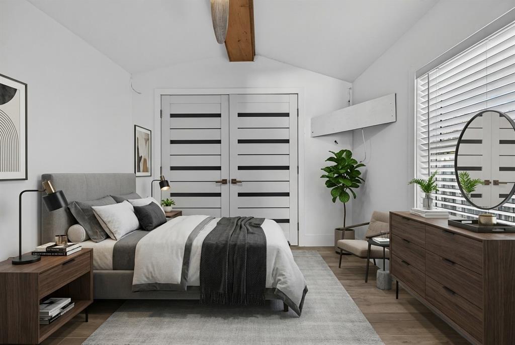 181 Northeast 15th Terrace Boca Raton, FL 33431 - Photo 21 of 51 a bedroom with a bed and a potted plant