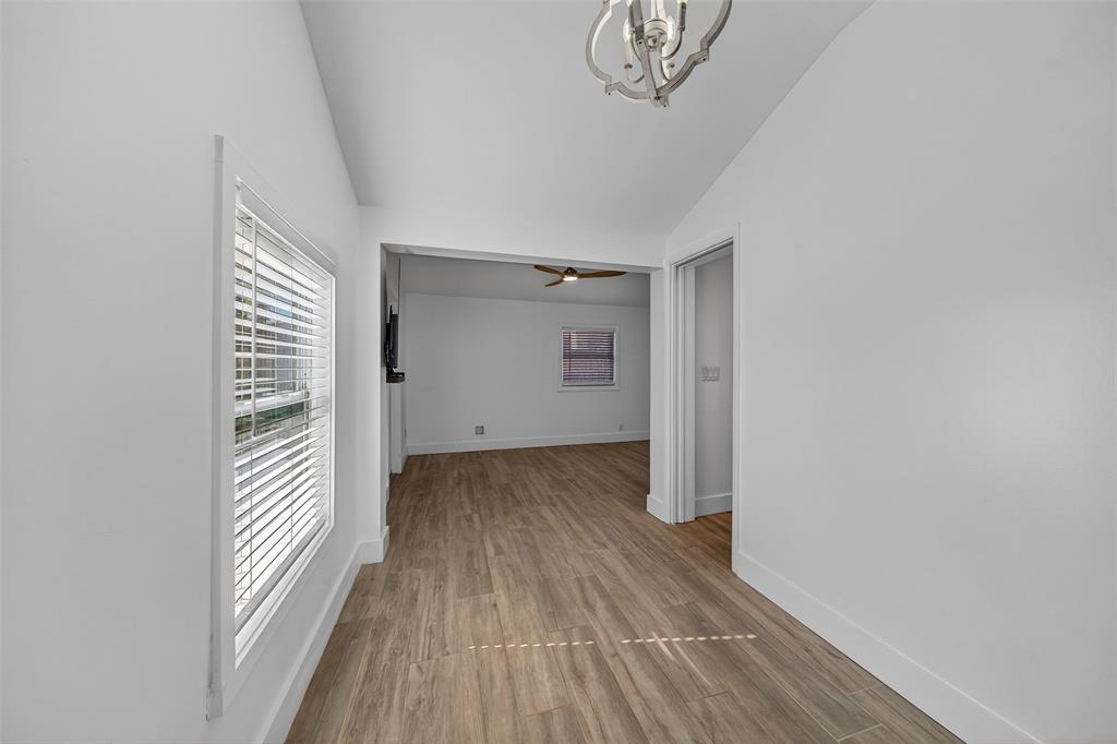 181 Northeast 15th Terrace Boca Raton, FL 33431 - Photo 39 of 51 a view of a hallway with wooden floor and closet