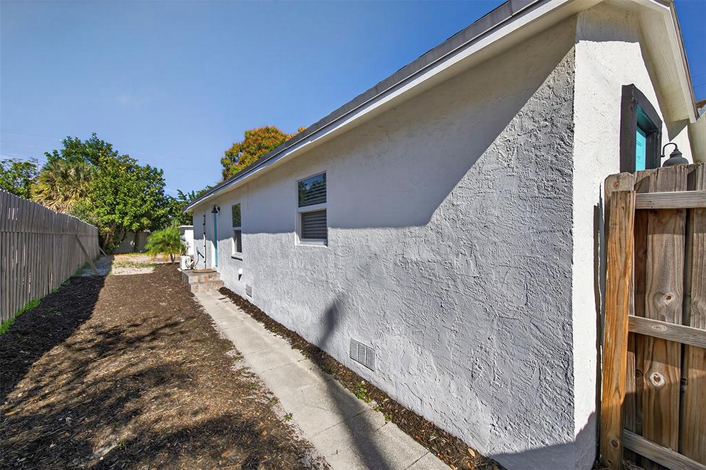 181 Northeast 15th Terrace Boca Raton, FL 33431 - Photo 41 of 51 a view of a house with a large window