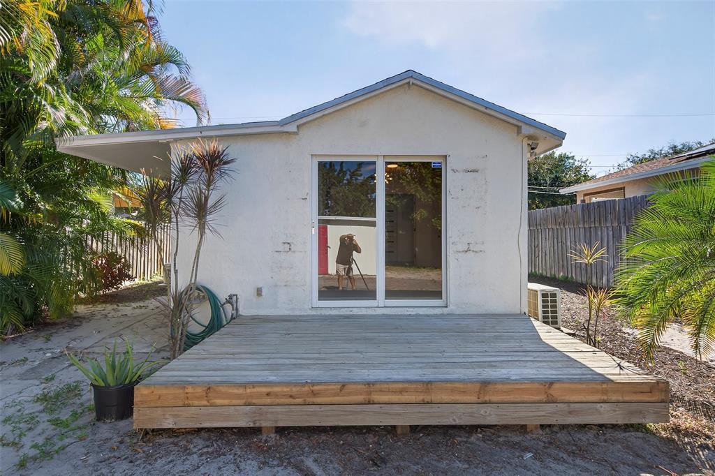 181 Northeast 15th Terrace Boca Raton, FL 33431 - Photo 50 of 51 a front view of a house with garden