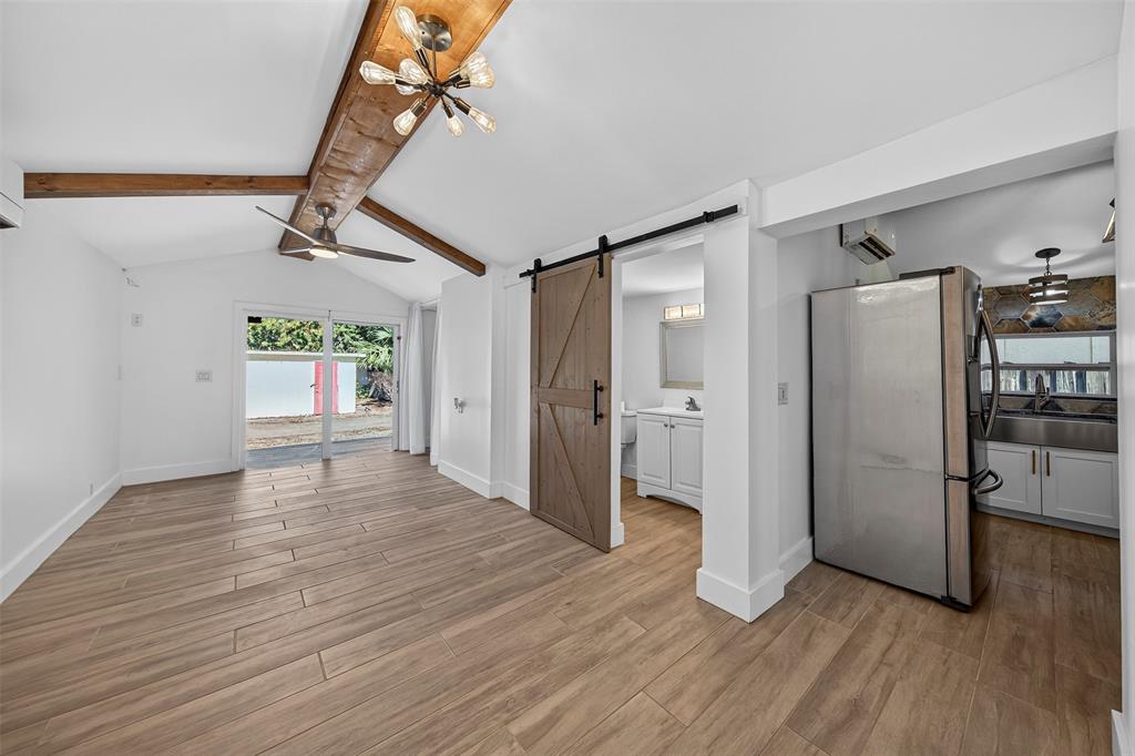 181 Northeast 15th Terrace Boca Raton, FL 33431 - Photo 10 of 51 a view of empty room with wooden floor