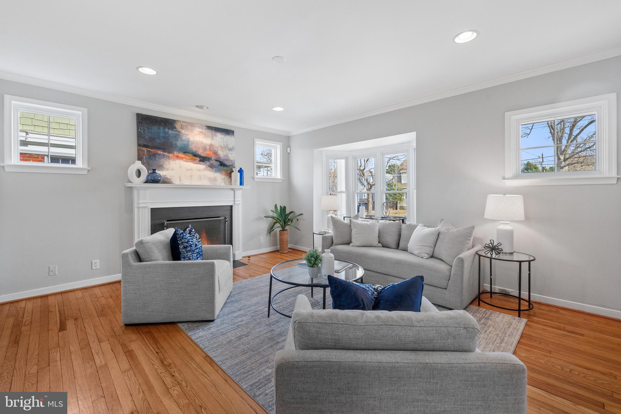 202 Russell Road Alexandria, VA 22301 - Photo 12 of 70 a living room with furniture and a fireplace