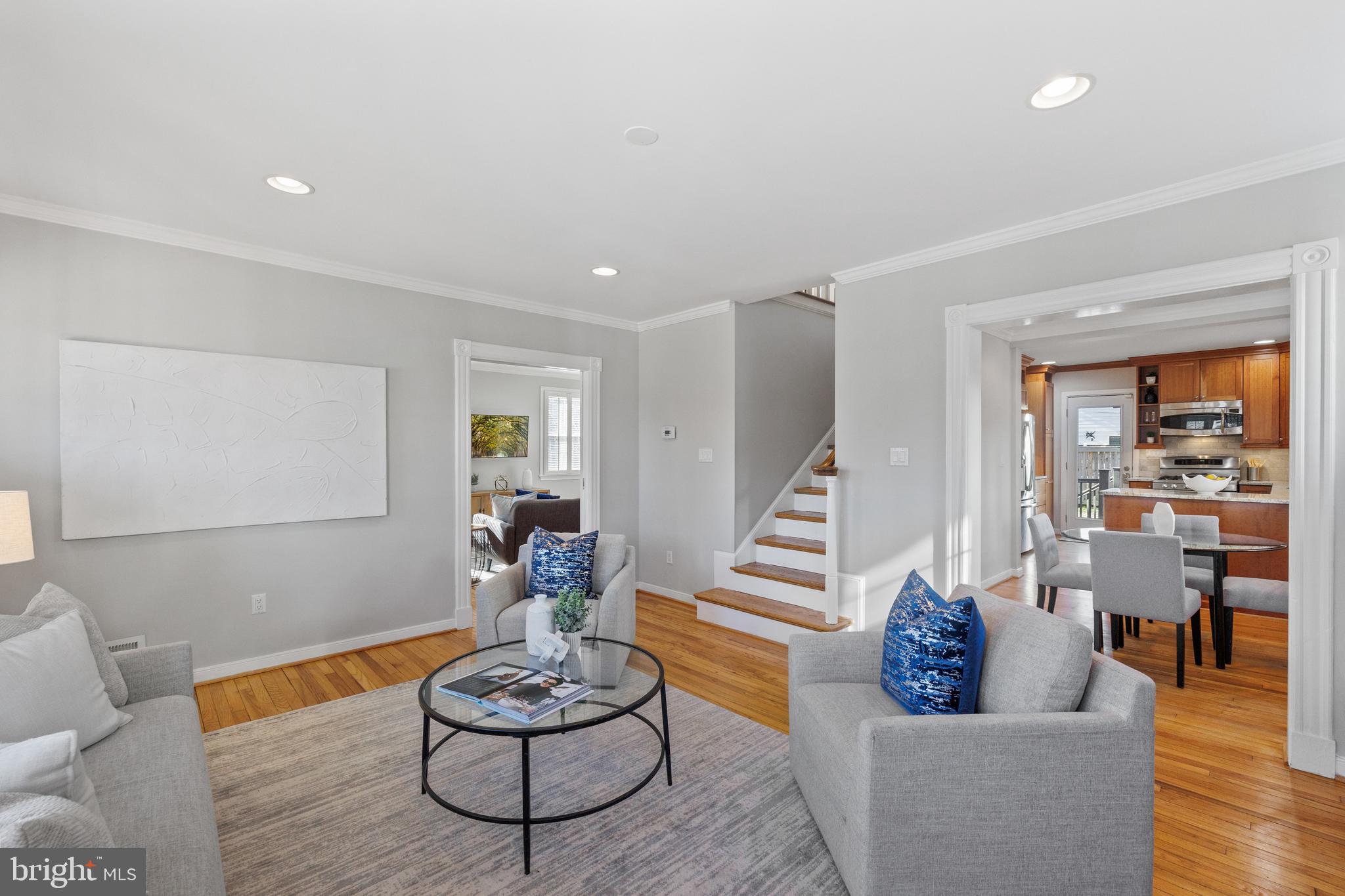 202 Russell Road Alexandria, VA 22301 - Photo 15 of 70 a living room with furniture and a wooden floor