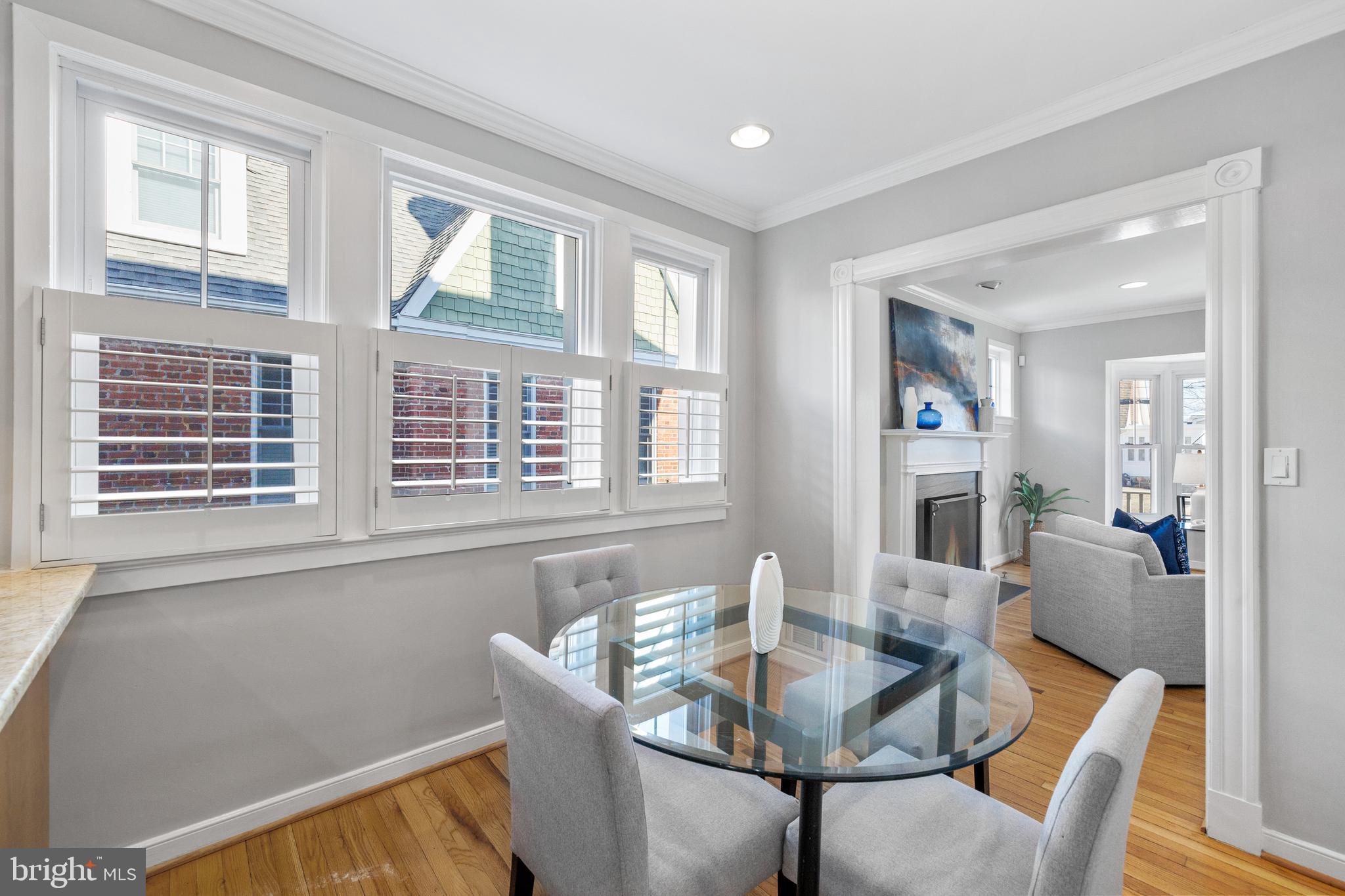 202 Russell Road Alexandria, VA 22301 - Photo 17 of 70 a view of a dining room with furniture and wooden floor