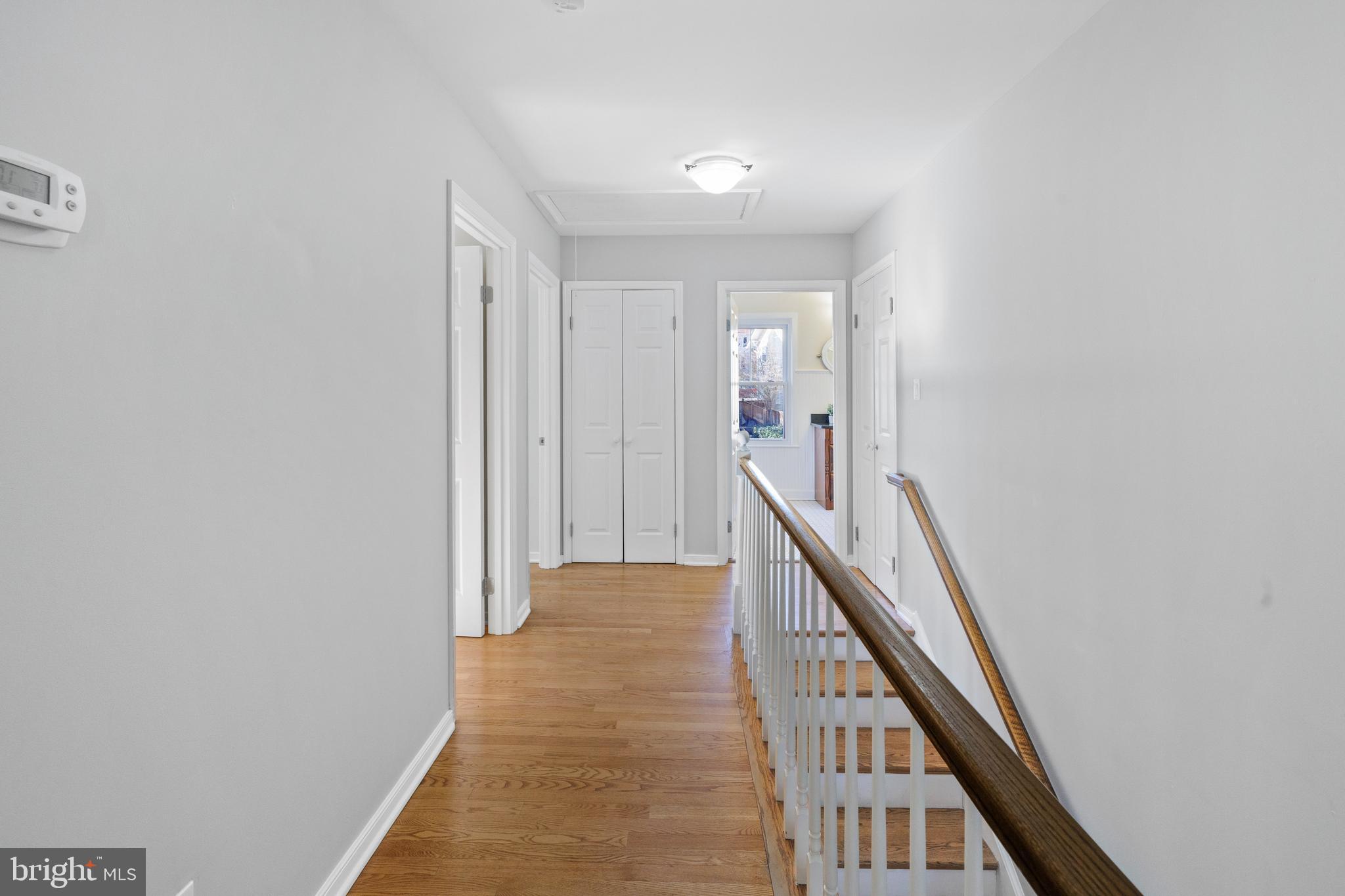 202 Russell Road Alexandria, VA 22301 - Photo 35 of 70 a view of a hallway with wooden floor and entryway