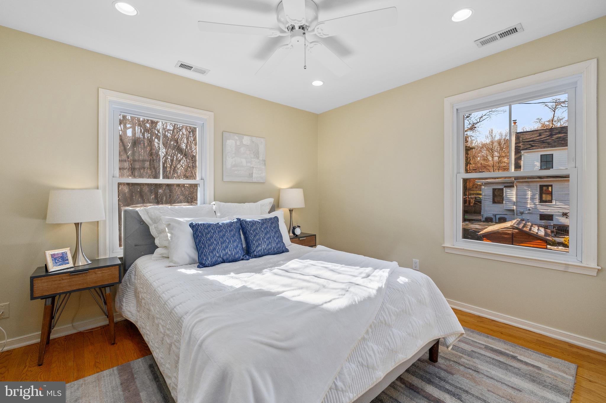 202 Russell Road Alexandria, VA 22301 - Photo 44 of 70 a bedroom with a large bed and a window