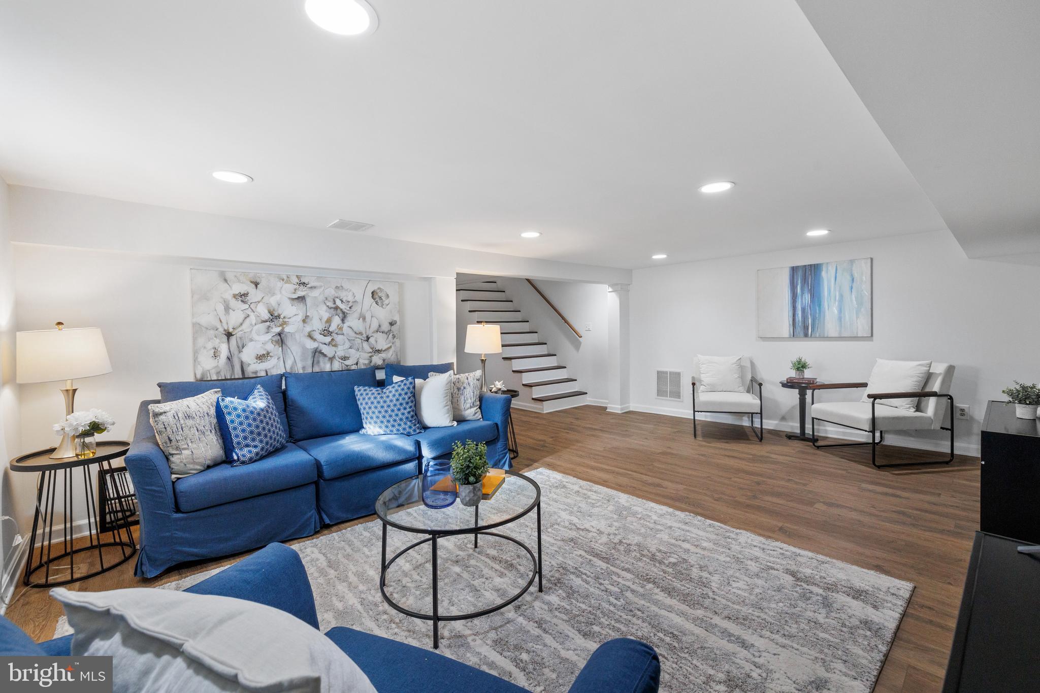 202 Russell Road Alexandria, VA 22301 - Photo 46 of 70 a living room with furniture and wooden floor