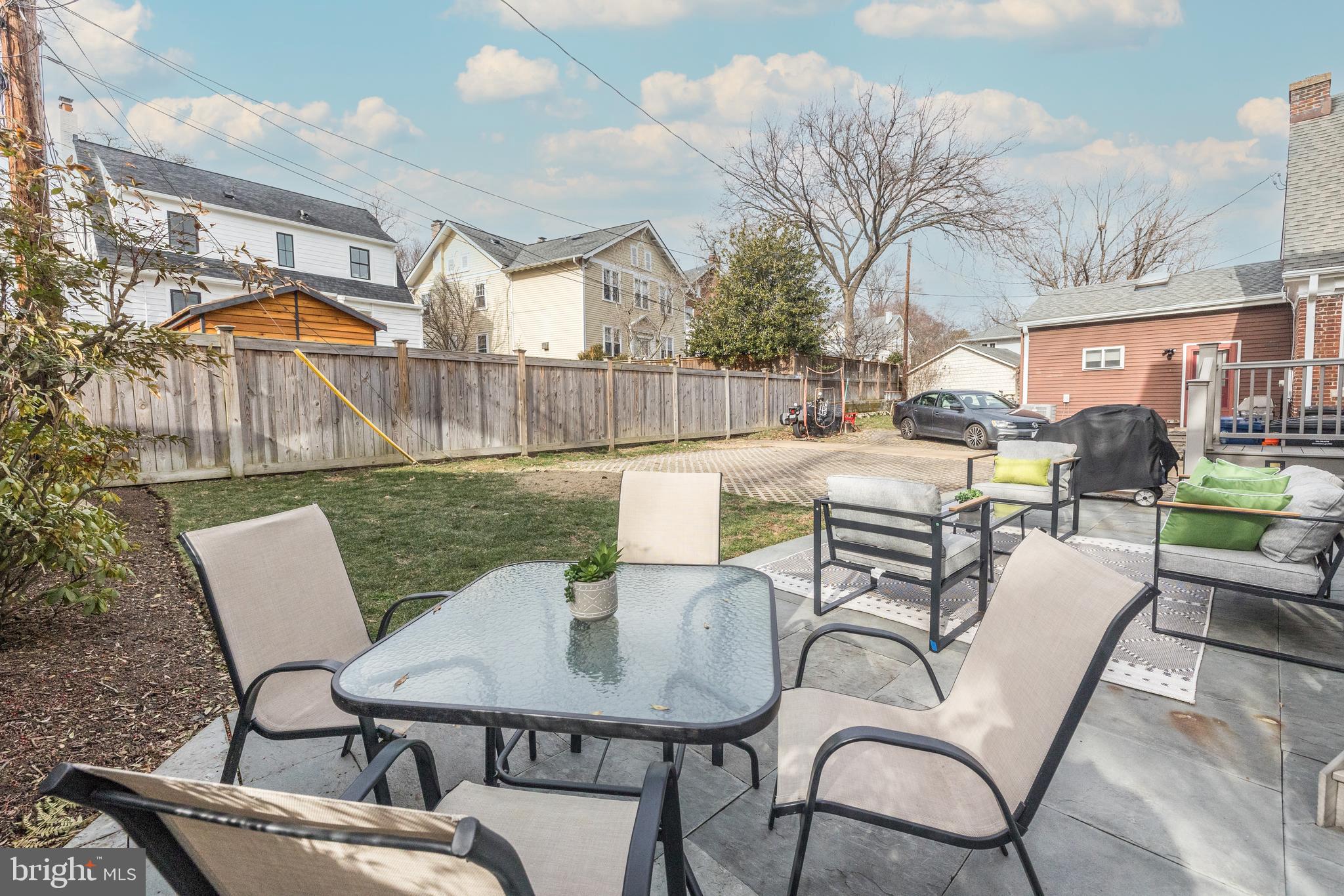 202 Russell Road Alexandria, VA 22301 - Photo 55 of 70 a view of a patio with couches table and chairs
