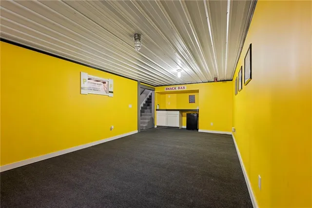 a view of a big room with wooden floor