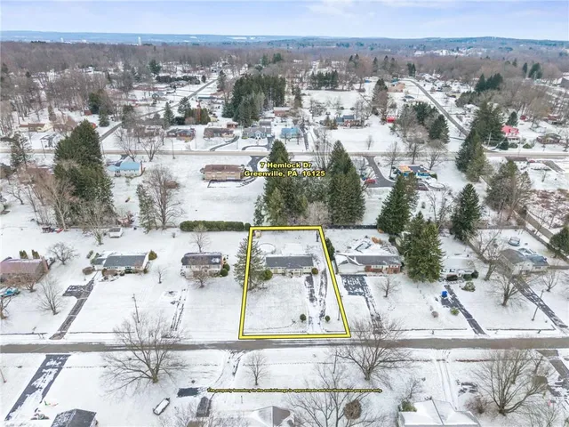 an aerial view of multiple house