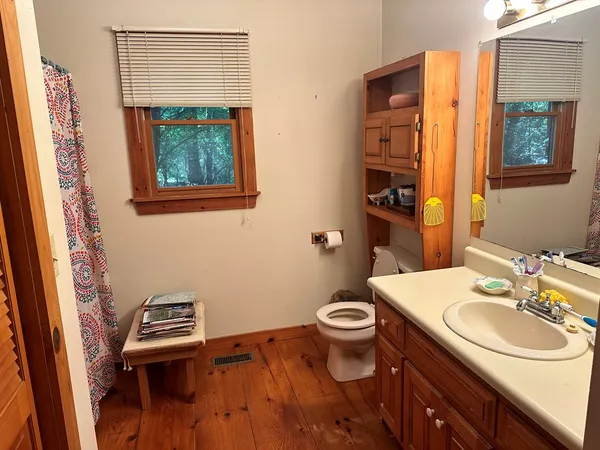 a view of a chairs and table in a patio