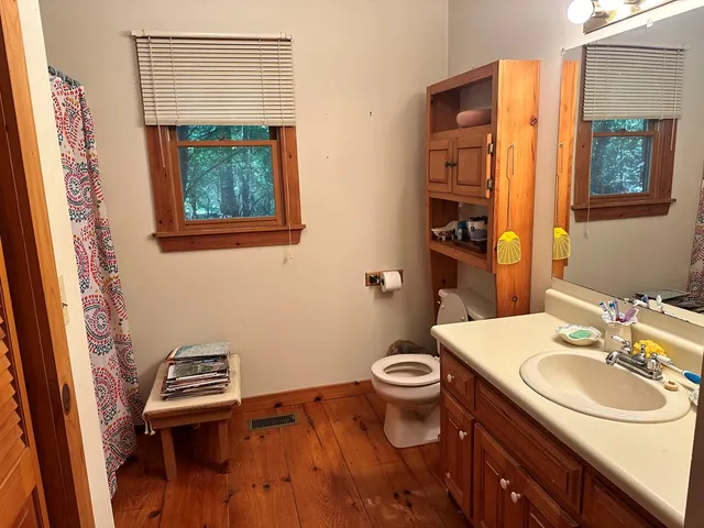 a view of a chairs and table in a patio