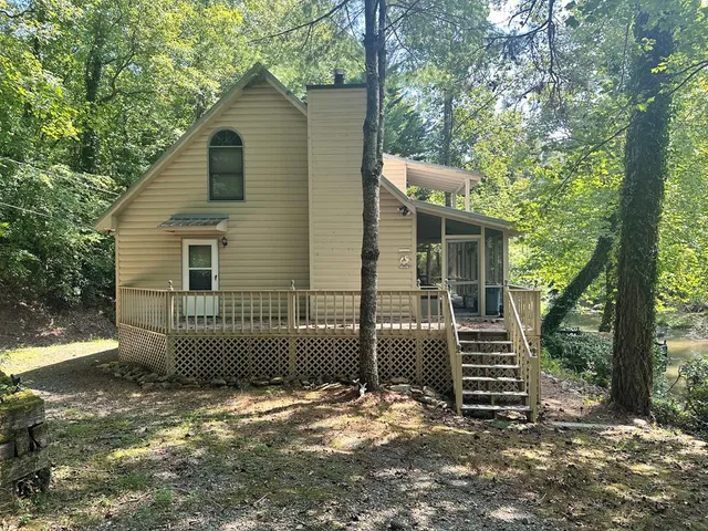 a view of balcony with wooden floor and outdoor space