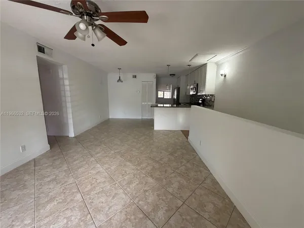 en view interior of a house and chandelier fan