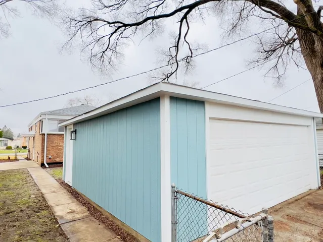 a view of a street with a car parked side of it