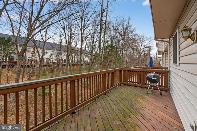 a view of a two chairs on the roof deck