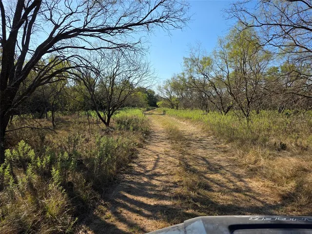 a view of a house with a street