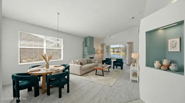 a living room with furniture and window