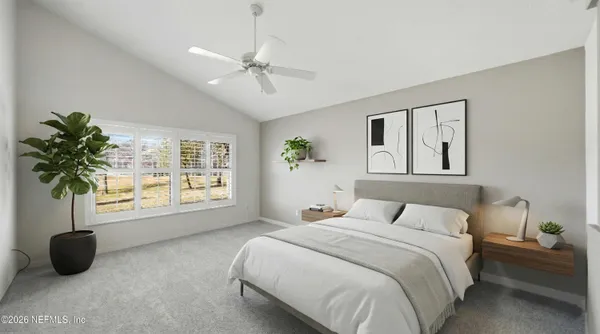 an empty room with a ceiling fan and a fan