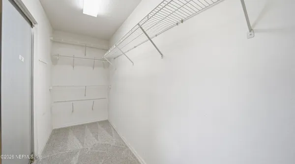 a view of a swimming pool with a lake view